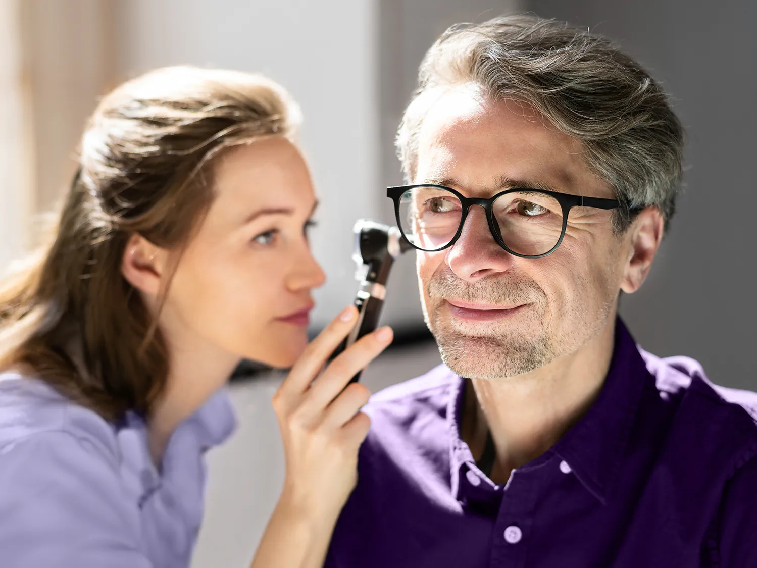 Otolaryngology ear check for hearing loss using otoscope