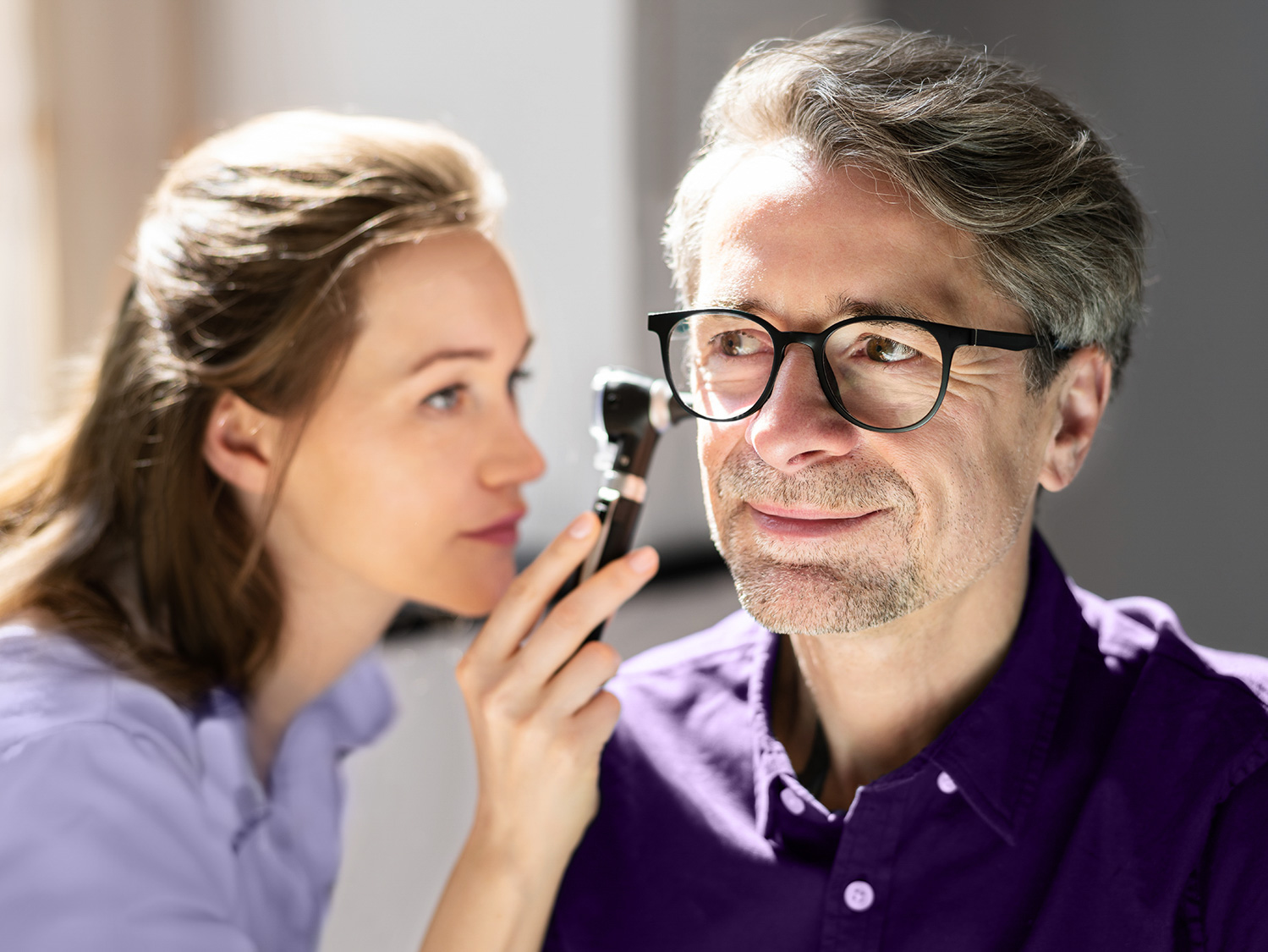 Otolaryngology ear check for hearing loss using otoscope