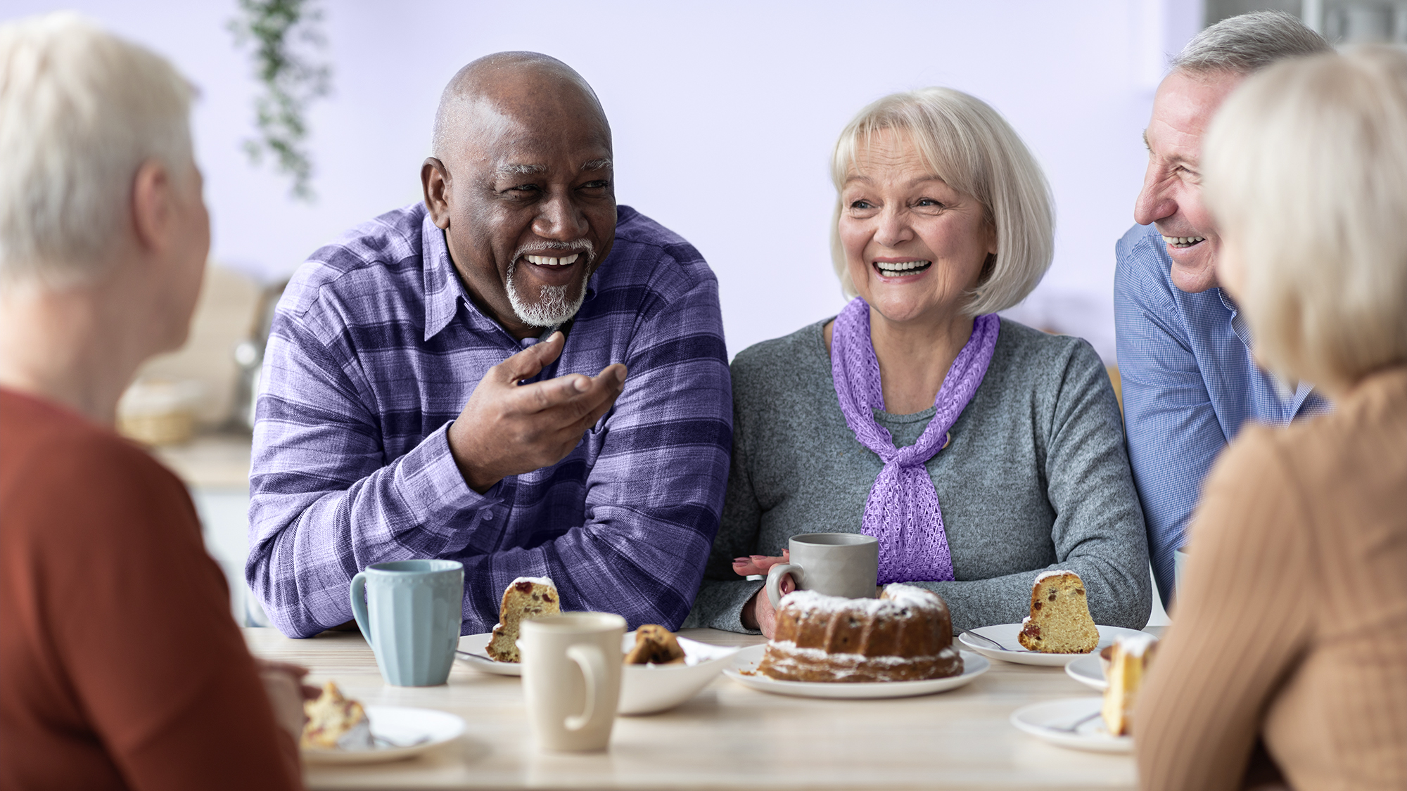 Experience the joy of catching up with friends over a cup of coffee, made even better by the use of hearing aids.
