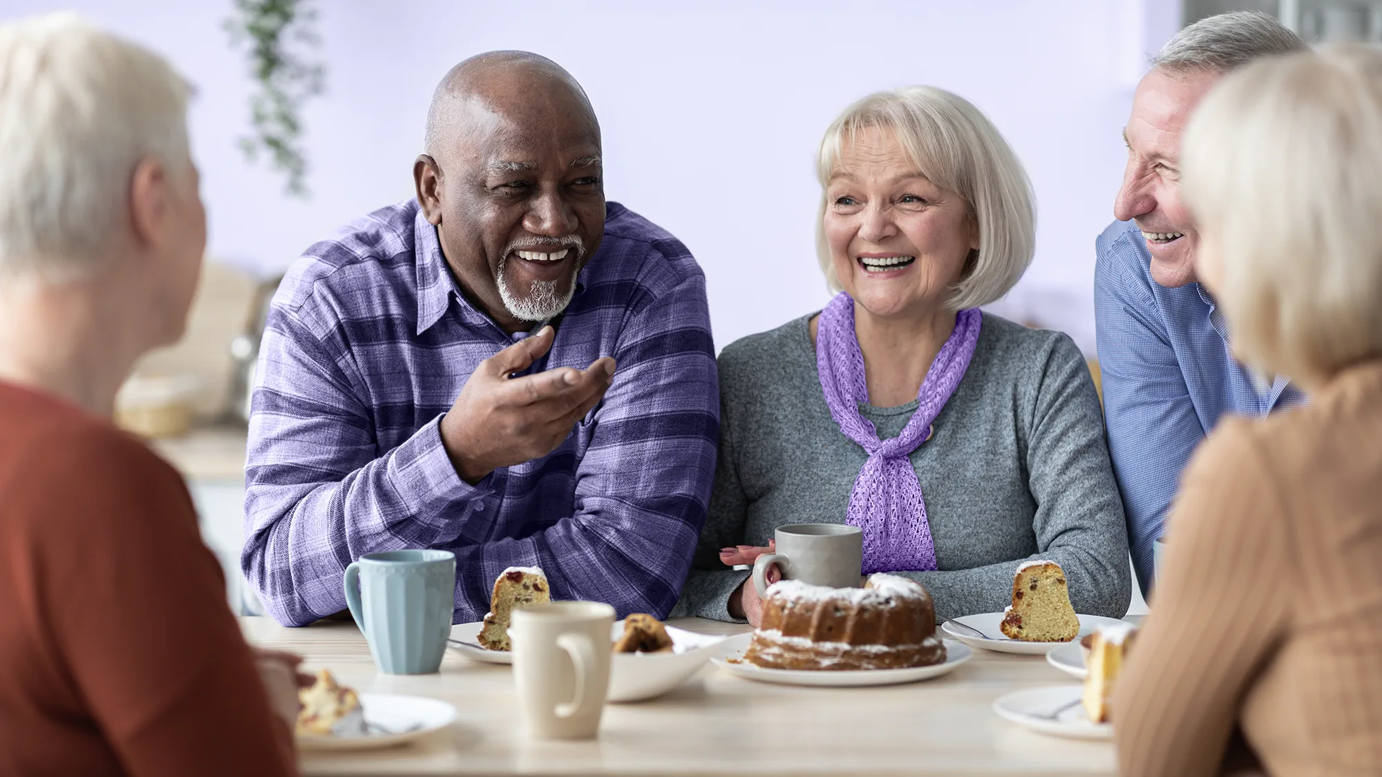 Experience the joy of catching up with friends over a cup of coffee, made even better by the use of hearing aids.