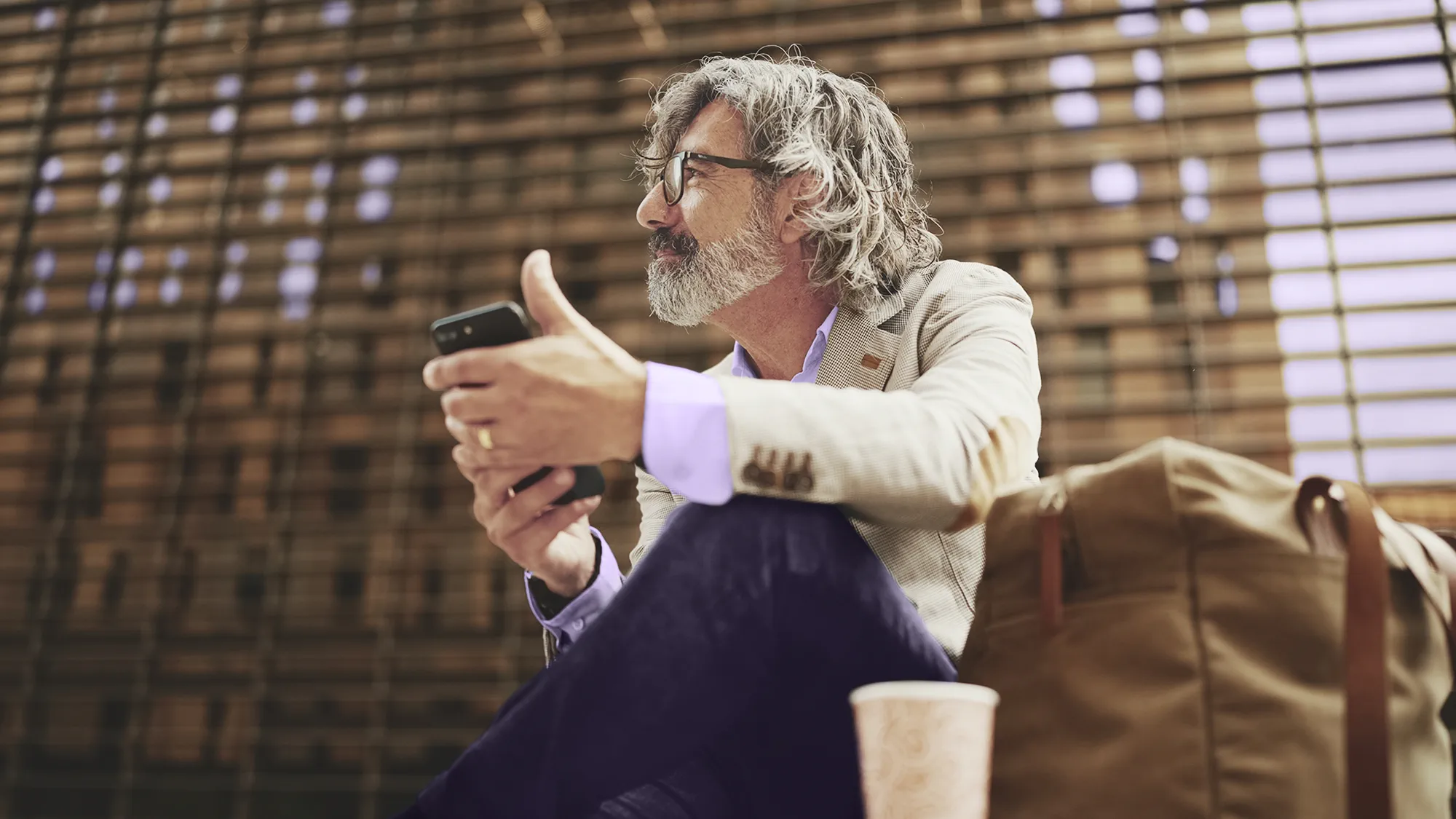 Man waiting for takeoff, wearing hearing aids