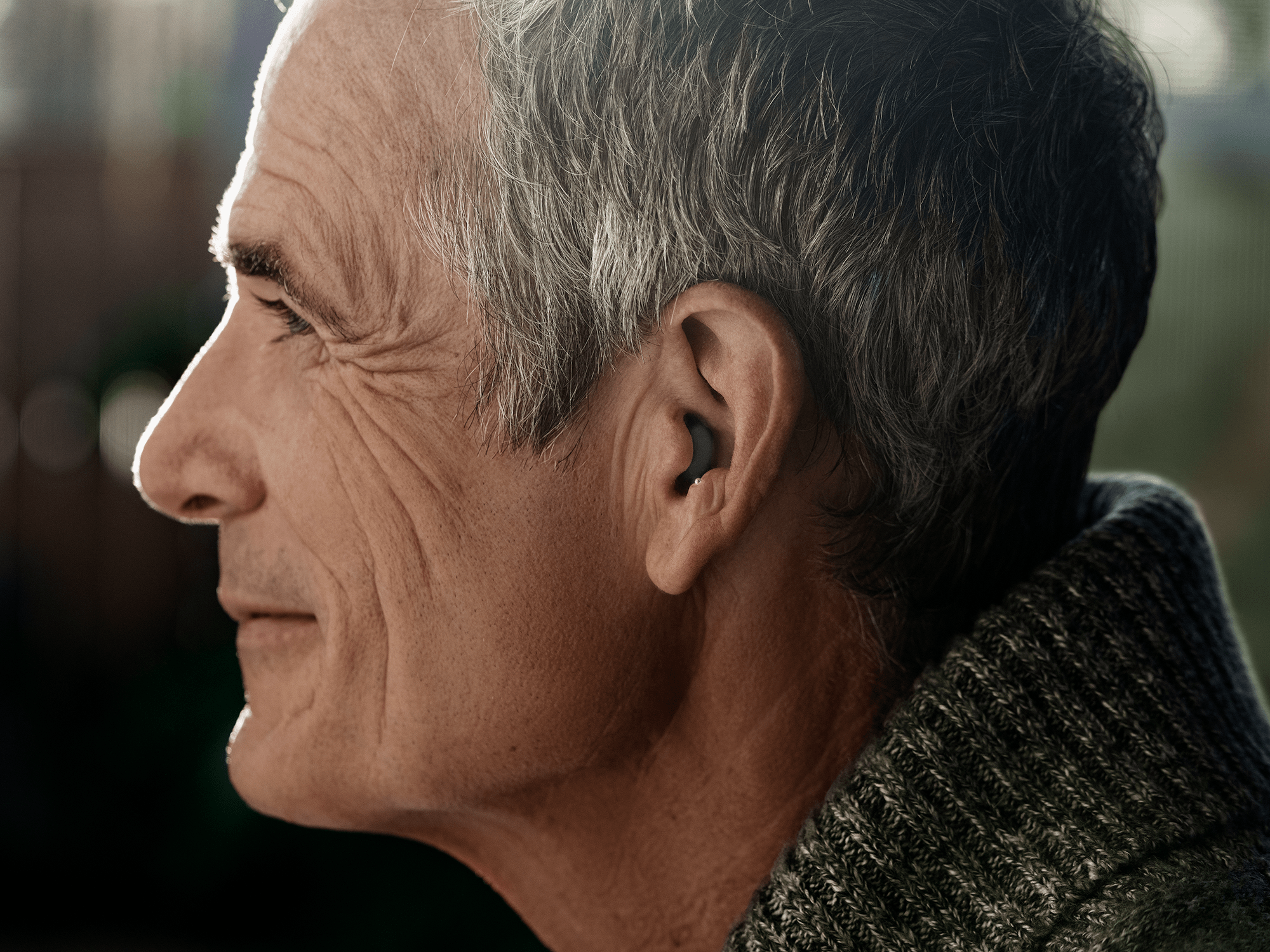Sony's cre-c10 over-the-counter self-fitting hearing aids.  Fits in the earcanal for a nearly invisible look.