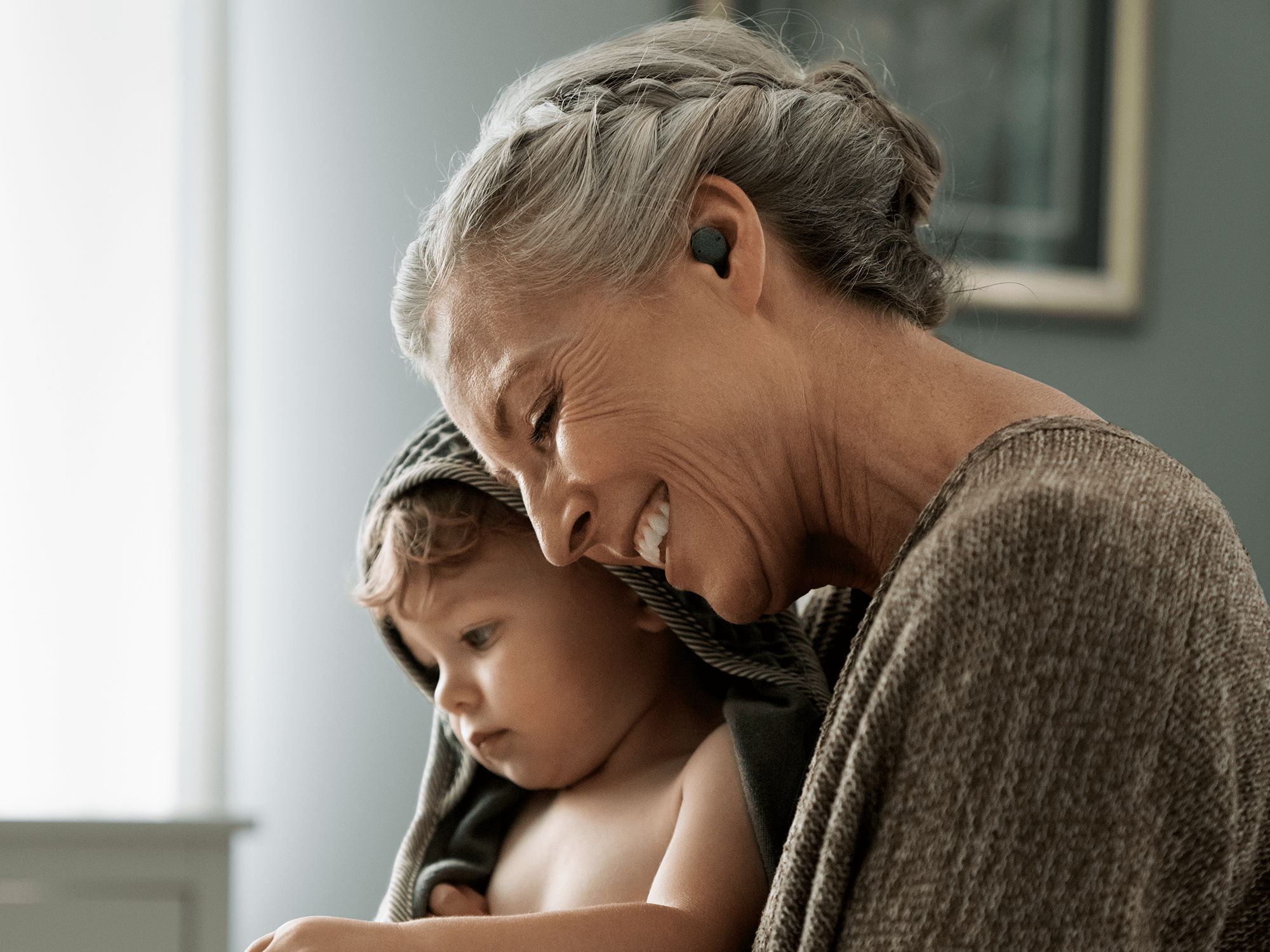 Sony's cre-e10 over-the-counter self-fitting earbud hearing aids in an earbud design. Doesn't look like a hearing aid.