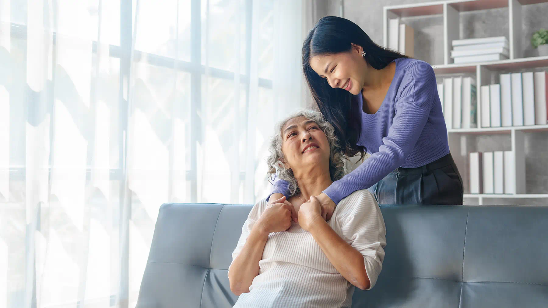 mother and daughter at living room
