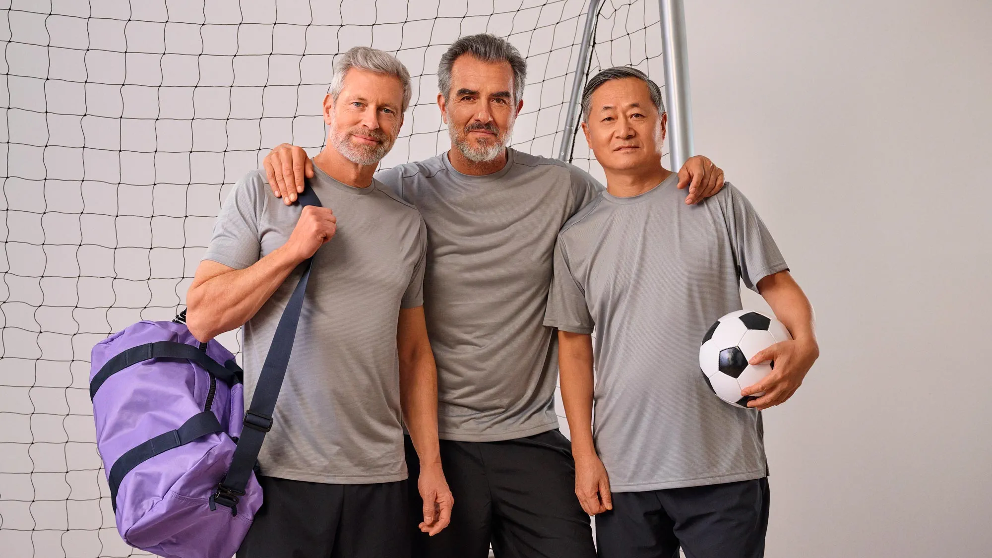 friends playing soccer hearing aids