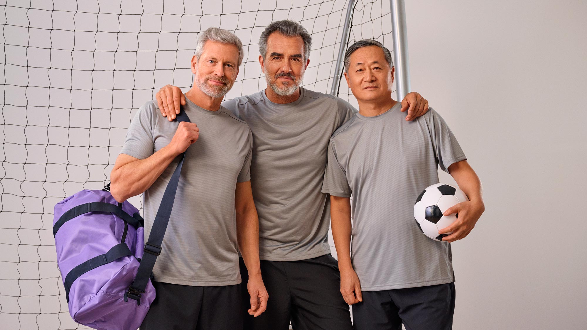 friends playing soccer hearing aids