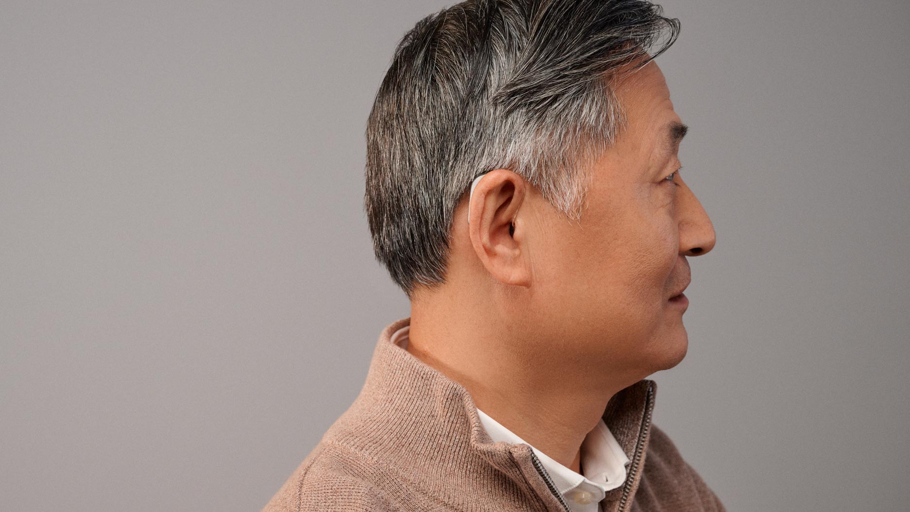 man wearing hearusa modern hearing aids
