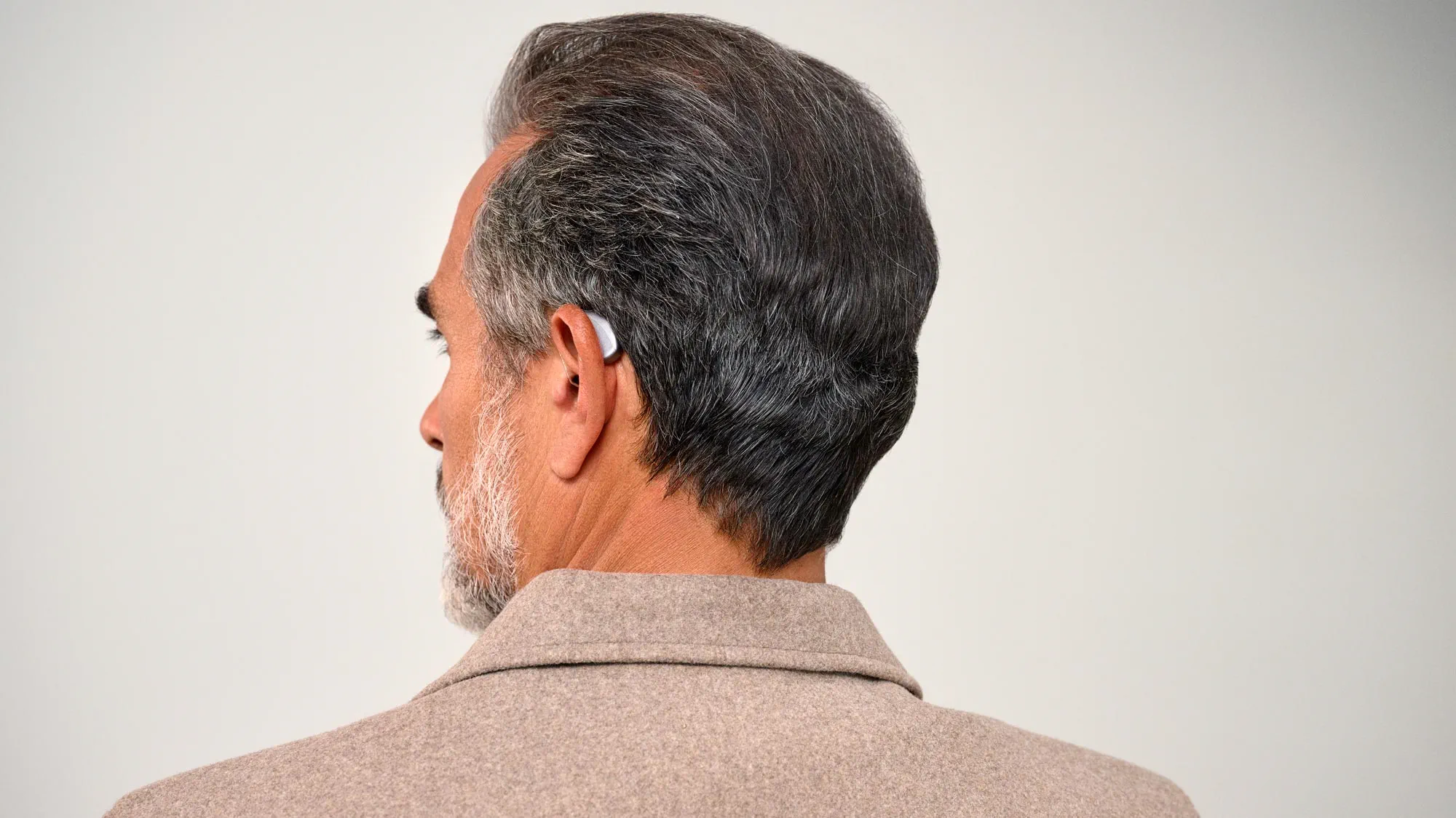 man with hearing aids