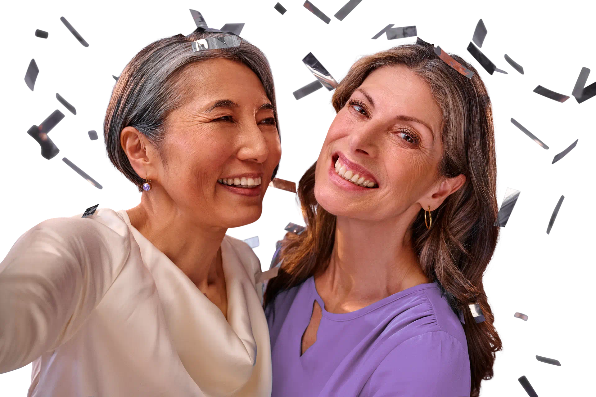 friends celebrating and smiling hearing aids