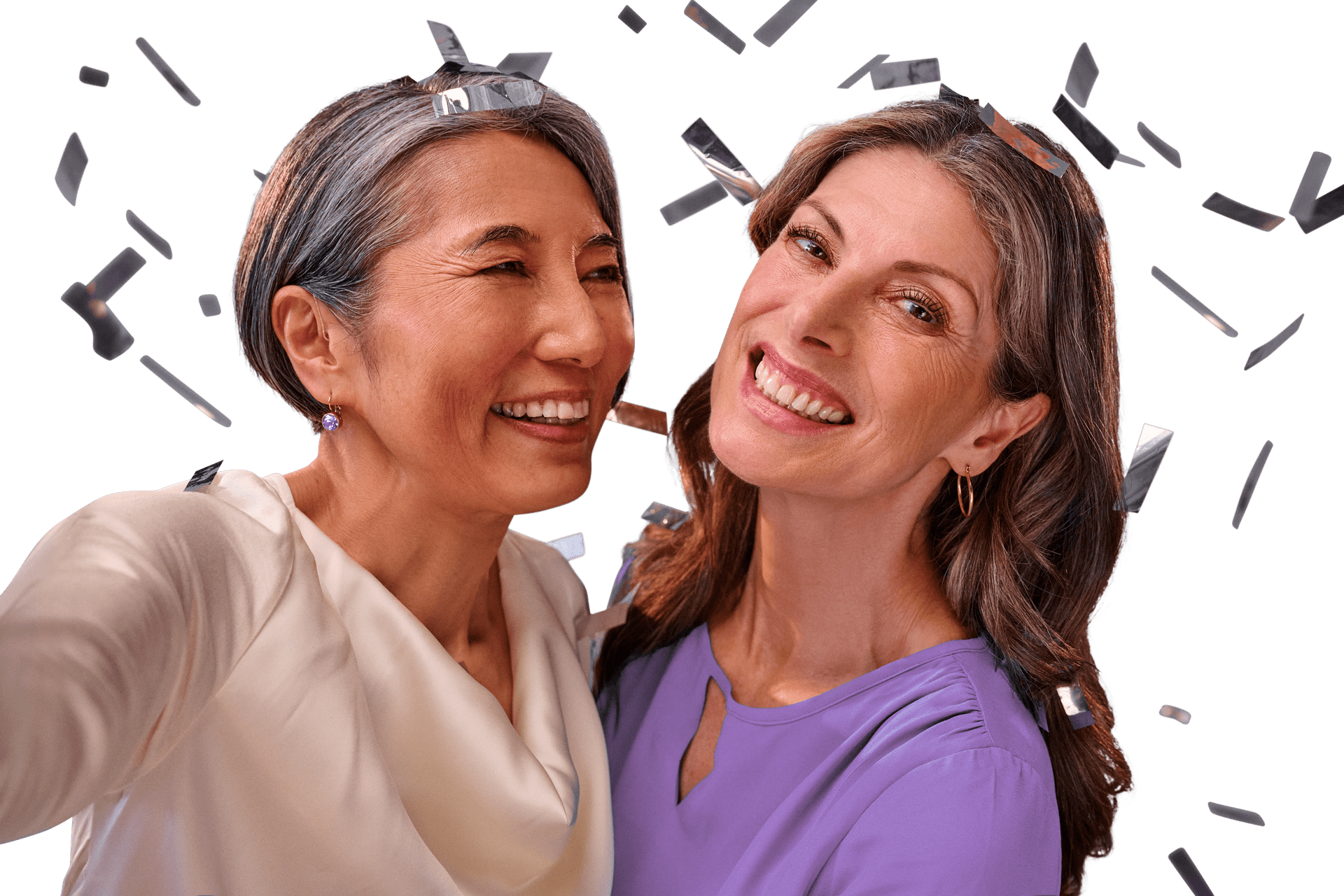 friends celebrating and smiling hearing aids