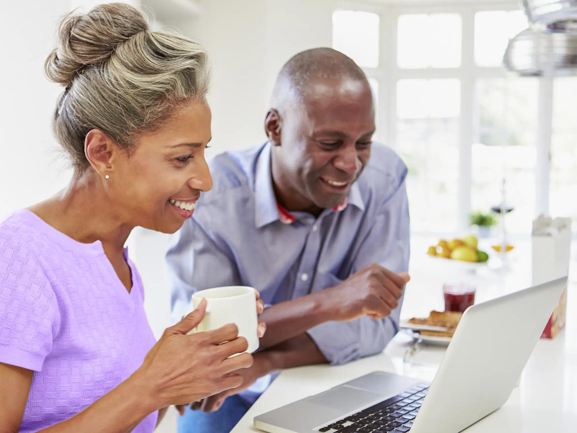 people looking at the computer monitor